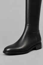 Knee High Riding Boots with Turn Lock Strap Noor Laurent